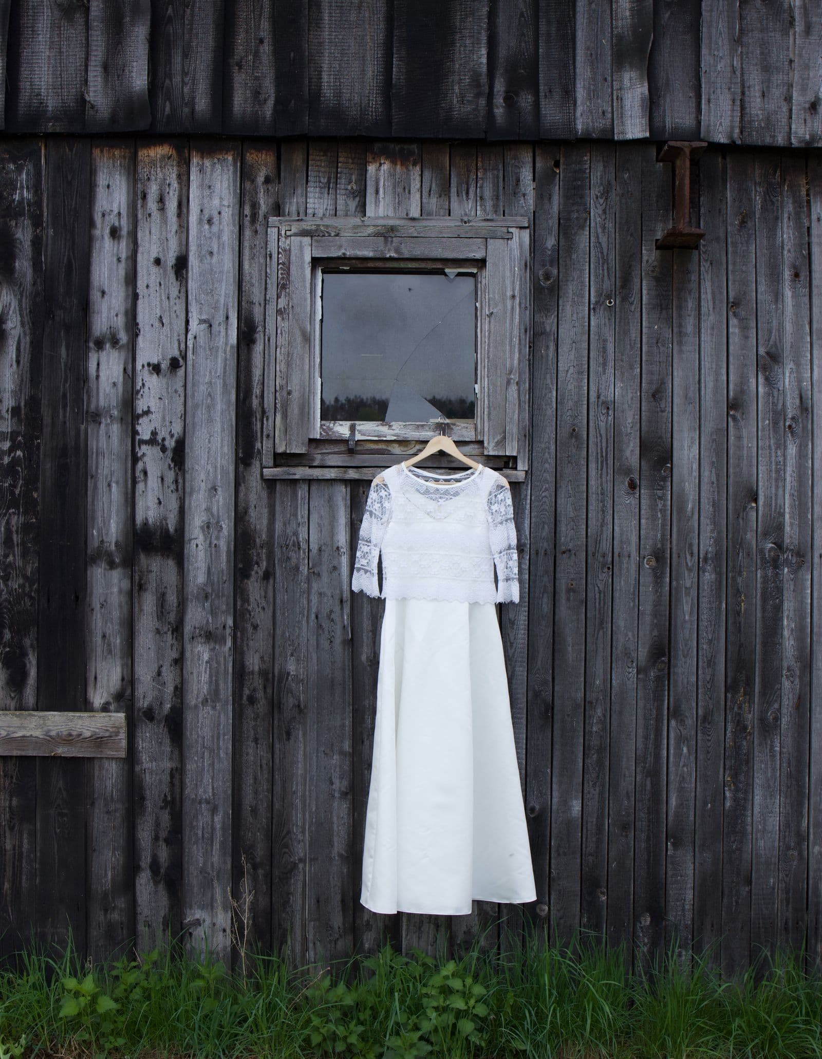 A boutique owner's phone snap of a piece, photographed in the shop.